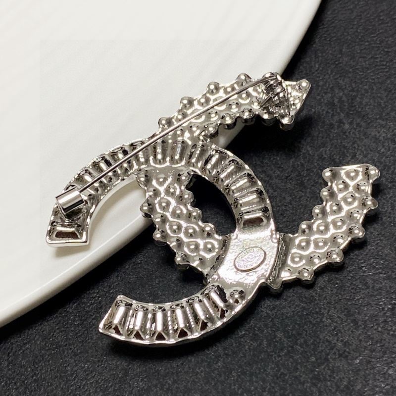 Ch**el brooches